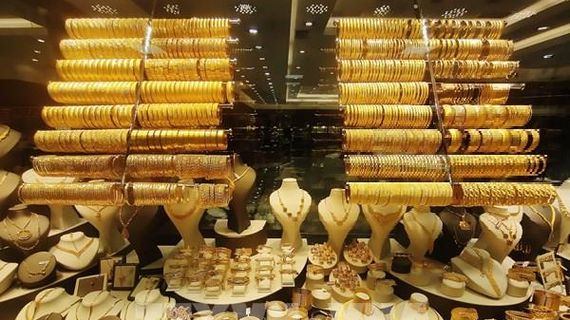 Chịu sức ép từ đồng USD, giá vàng rời khỏi mức cao kỷ lục