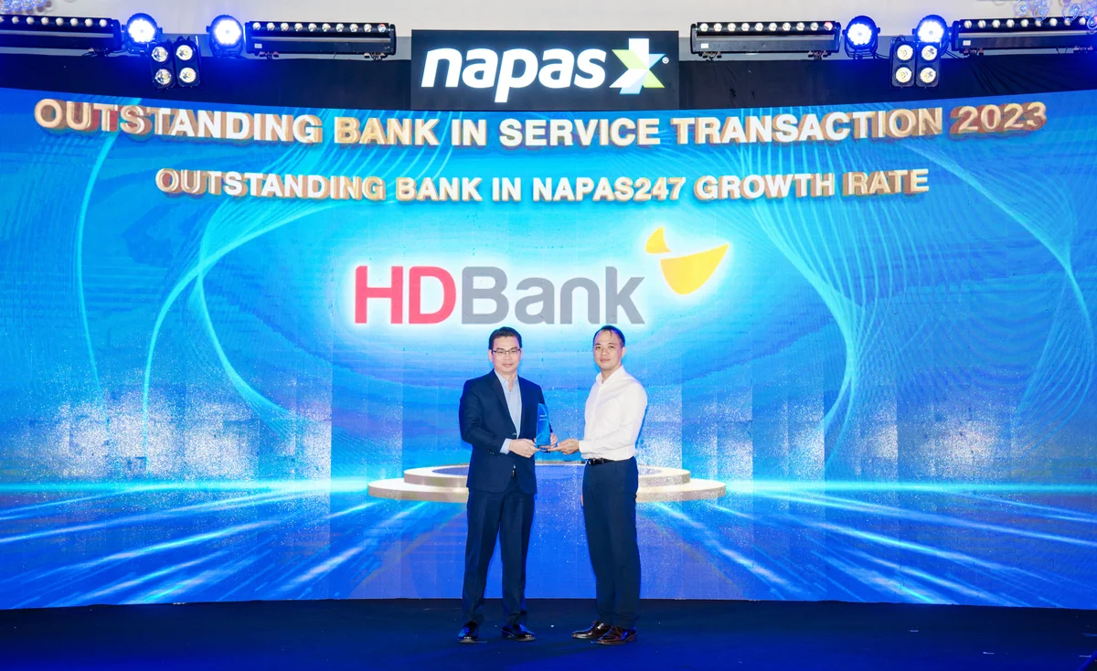 Mr. Do Van Vu - Deputy Director of Card Center representing the bank to receive the award at the Conference.