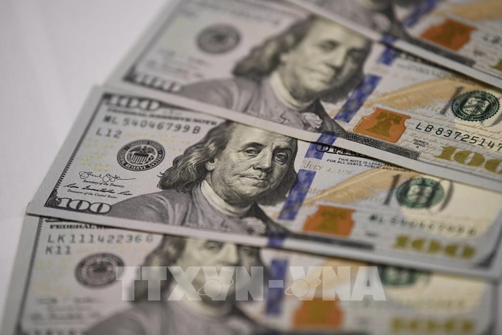 Đồng USD tại ngân hàng ở Washington DC. Ảnh: THX/TTXVN