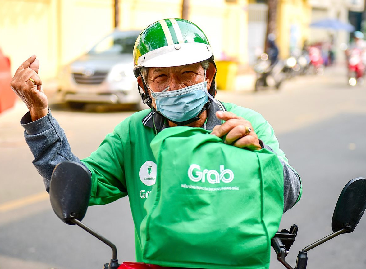 Grab lần đầu có lãi